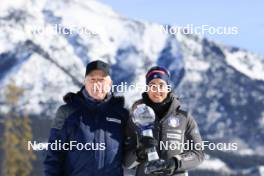 14.03.2024, Canmore, Canada (CAN): Olle Dahlin (SWE), IBU President, Lisa Vittozzi (ITA), (l-r) - IBU World Cup Biathlon, trophies, Canmore (CAN). www.nordicfocus.com. © Manzoni/NordicFocus. Every downloaded picture is fee-liable.