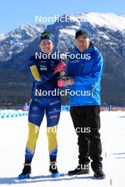 17.03.2024, Canmore, Canada (CAN): Elvira Oeberg (SWE), Olle Dahlin (SWE), IBU President, (l-r) - IBU World Cup Biathlon, trophies, Canmore (CAN). www.nordicfocus.com. © Manzoni/NordicFocus. Every downloaded picture is fee-liable.
