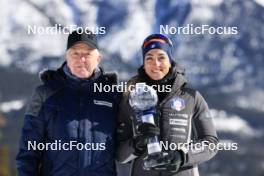 14.03.2024, Canmore, Canada (CAN): Olle Dahlin (SWE), IBU President, Lisa Vittozzi (ITA), (l-r) - IBU World Cup Biathlon, trophies, Canmore (CAN). www.nordicfocus.com. © Manzoni/NordicFocus. Every downloaded picture is fee-liable.