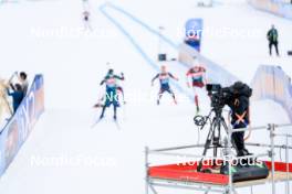13.03.2024, Canmore, Canada (CAN): Event Feature: Installing a TV camera while undifined athletes compete - IBU World Cup Biathlon, training, Canmore (CAN). www.nordicfocus.com. © Manzoni/NordicFocus. Every downloaded picture is fee-liable.