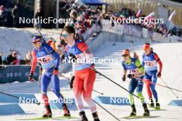28.01.2024, Brezno-Osrblie, Slovakia (SVK): George Buta (ROU), Zachary Connelly (CAN), Jasa Zidar (SLO), Tomas Sklenarik (SVK), (l-r) - IBU Open European Championships Biathlon, mixed relay, Brezno-Osrblie (SVK). www.nordicfocus.com. © Reichert/NordicFocus. Every downloaded picture is fee-liable.
