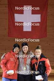 23.03.2024, Oberwald, Switzerland (SUI): Ronja Rietveld (SUI), Lara Berwert (SUI), Elina Biderbost (SUI), (l-r) - Swiss Championships biathlon, prize giving ceremony, Oberwald (SUI). www.nordicfocus.com. © Manzoni/NordicFocus. Every downloaded picture is fee-liable.