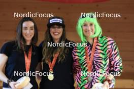 23.03.2024, Oberwald, Switzerland (SUI): Aita Gasparin (SUI), Lena Haecki-Gross (SUI), Flurina Volken (SUI), (l-r) - Swiss Championships biathlon, prize giving ceremony, Oberwald (SUI). www.nordicfocus.com. © Manzoni/NordicFocus. Every downloaded picture is fee-liable.