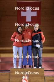 23.03.2024, Oberwald, Switzerland (SUI): Annina Zberg (SUI), Ronja Rietveld (SUI), Elina Biderbost (SUI), (l-r) - Swiss Championships biathlon, prize giving ceremony, Oberwald (SUI). www.nordicfocus.com. © Manzoni/NordicFocus. Every downloaded picture is fee-liable.