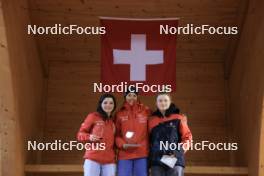 23.03.2024, Oberwald, Switzerland (SUI): Annina Zberg (SUI), Ronja Rietveld (SUI), Elina Biderbost (SUI), (l-r) - Swiss Championships biathlon, prize giving ceremony, Oberwald (SUI). www.nordicfocus.com. © Manzoni/NordicFocus. Every downloaded picture is fee-liable.