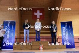 23.03.2024, Oberwald, Switzerland (SUI): Lara Marti (SUI), Alessia Laager (SUI), Lena Baumann (SUI), (l-r) - Swiss Championships biathlon, prize giving ceremony, Oberwald (SUI). www.nordicfocus.com. © Manzoni/NordicFocus. Every downloaded picture is fee-liable.