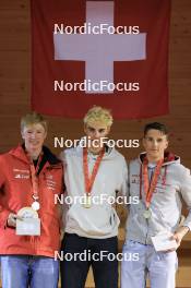 23.03.2024, Oberwald, Switzerland (SUI): Matthias Riebli (SUI), Silvano Demarmels (SUI), Loris Maier (SUI), (l-r) - Swiss Championships biathlon, prize giving ceremony, Oberwald (SUI). www.nordicfocus.com. © Manzoni/NordicFocus. Every downloaded picture is fee-liable.