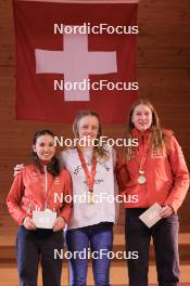 23.03.2024, Oberwald, Switzerland (SUI): Giannina Piller (SUI), Alessia Laager (SUI), Eliane Kiser (SUI), (l-r) - Swiss Championships biathlon, prize giving ceremony, Oberwald (SUI). www.nordicfocus.com. © Manzoni/NordicFocus. Every downloaded picture is fee-liable.
