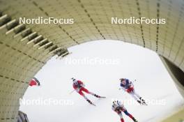 18.02.2024, Nove Mesto na Morave, Czechia (CZE): Adam Runnalls (CAN), Timofei Lapshin (KOR), (l-r) - IBU World Championships Biathlon, mass men, Nove Mesto na Morave (CZE). www.nordicfocus.com. © Thibaut/NordicFocus. Every downloaded picture is fee-liable.