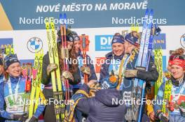 17.02.2024, Nove Mesto na Morave, Czechia (CZE): Lou Jeanmonnot (FRA), Sophie Chauveau (FRA), Justine Braisaz-Bouchet (FRA), Julia Simon (FRA), (l-r) - IBU World Championships Biathlon, medals, Nove Mesto na Morave (CZE). www.nordicfocus.com. © Thibaut/NordicFocus. Every downloaded picture is fee-liable.
