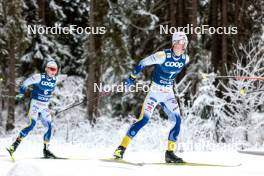 01.01.2024, Toblach, Italy (ITA): Jens Burman (SWE), William Poromaa (SWE), (l-r)  - FIS world cup cross-country, tour de ski, pursuit, Toblach (ITA). www.nordicfocus.com. © Modica/NordicFocus. Every downloaded picture is fee-liable.