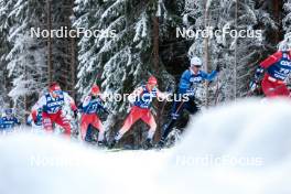 01.01.2024, Toblach, Italy (ITA): Erwan Kaeser (SUI), Janik Riebli (SUI), Imanol Rojo (ESP), (l-r)  - FIS world cup cross-country, tour de ski, pursuit, Toblach (ITA). www.nordicfocus.com. © Modica/NordicFocus. Every downloaded picture is fee-liable.