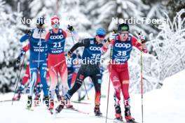 01.01.2024, Toblach, Italy (ITA): Cyril Faehndrich (SUI), Lucas Boegl (GER), Mika Vermeulen (AUT), (l-r)  - FIS world cup cross-country, tour de ski, pursuit, Toblach (ITA). www.nordicfocus.com. © Modica/NordicFocus. Every downloaded picture is fee-liable.