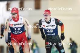 03.01.2024, Davos, Switzerland (SUI): Roman Schaad (SUI), Jan Stoelben (GER), (l-r)  - FIS world cup cross-country, tour de ski, individual sprint, Davos (SUI). www.nordicfocus.com. © Modica/NordicFocus. Every downloaded picture is fee-liable.