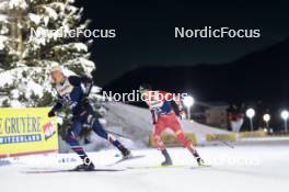 03.01.2024, Davos, Switzerland (SUI): Remi Bourdin (FRA), Michael Foettinger (AUT), (l-r)  - FIS world cup cross-country, tour de ski, individual sprint, Davos (SUI). www.nordicfocus.com. © Modica/NordicFocus. Every downloaded picture is fee-liable.