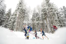 04.01.2024, Davos, Switzerland (SUI): Anna Comarella (ITA), Moa Ilar (SWE), Victoria Carl (GER), Patricija Eiduka (LAT), (l-r)  - FIS world cup cross-country, tour de ski, pursuit, Davos (SUI). www.nordicfocus.com. © Modica/NordicFocus. Every downloaded picture is fee-liable.