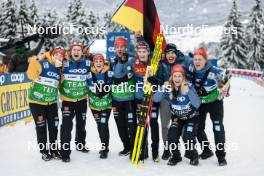 07.01.2024, Val di Fiemme, Italy (ITA): Friedrich Moch (GER) with the staff of his Team - FIS world cup cross-country, tour de ski, final climb, Val di Fiemme (ITA). www.nordicfocus.com. © Modica/NordicFocus. Every downloaded picture is fee-liable.