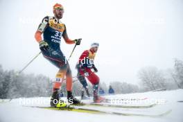 06.01.2024, Val di Fiemme, Italy (ITA): Thomas Maloney Westgaard (IRL), Haavard Solaas Taugboel (NOR), (l-r)  - FIS world cup cross-country, tour de ski, mass, Val di Fiemme (ITA). www.nordicfocus.com. © Modica/NordicFocus. Every downloaded picture is fee-liable.