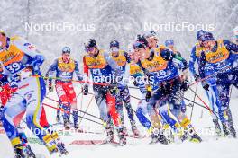 06.01.2024, Val di Fiemme, Italy (ITA): Olivier Leveille (CAN), Naoto Baba (JPN), (l-r)  - FIS world cup cross-country, tour de ski, mass, Val di Fiemme (ITA). www.nordicfocus.com. © Barbieri/NordicFocus. Every downloaded picture is fee-liable.