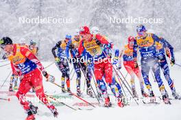 06.01.2024, Val di Fiemme, Italy (ITA): Harald Oestberg Amundsen (NOR), Hugo Lapalus (FRA), (l-r)  - FIS world cup cross-country, tour de ski, mass, Val di Fiemme (ITA). www.nordicfocus.com. © Barbieri/NordicFocus. Every downloaded picture is fee-liable.