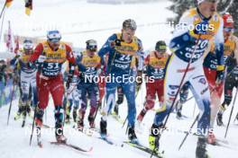 06.01.2024, Val di Fiemme, Italy (ITA): Haavard Solaas Taugboel (NOR), Remi Lindholm (FIN), (l-r)  - FIS world cup cross-country, tour de ski, mass, Val di Fiemme (ITA). www.nordicfocus.com. © Modica/NordicFocus. Every downloaded picture is fee-liable.