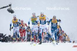 06.01.2024, Val di Fiemme, Italy (ITA): Calle Halfvarsson (SWE), Edvin Anger (SWE), William Poromaa (SWE), Remi Lindholm (FIN), (l-r)  - FIS world cup cross-country, tour de ski, mass, Val di Fiemme (ITA). www.nordicfocus.com. © Modica/NordicFocus. Every downloaded picture is fee-liable.