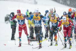 06.01.2024, Val di Fiemme, Italy (ITA): Imanol Rojo (ESP), Erik Valnes (NOR), (l-r)  - FIS world cup cross-country, tour de ski, mass, Val di Fiemme (ITA). www.nordicfocus.com. © Modica/NordicFocus. Every downloaded picture is fee-liable.