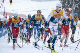 06.01.2024, Val di Fiemme, Italy (ITA): Haavard Solaas Taugboel (NOR), Remi Lindholm (FIN), Cyril Faehndrich (SUI), (l-r)  - FIS world cup cross-country, tour de ski, mass, Val di Fiemme (ITA). www.nordicfocus.com. © Modica/NordicFocus. Every downloaded picture is fee-liable.