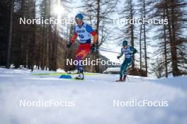 28.01.2024, Goms, Switzerland (SUI): Achbadrakh Batmunkh (MGL), Seve De Campo (AUS), (l-r)  - FIS world cup cross-country, mass, Goms (SUI). www.nordicfocus.com. © Modica/NordicFocus. Every downloaded picture is fee-liable.