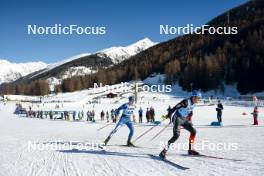 28.01.2024, Goms, Switzerland (SUI): Arsi Ruuskanen (FIN), Lucas Boegl (GER), (l-r)  - FIS world cup cross-country, mass, Goms (SUI). www.nordicfocus.com. © Modica/NordicFocus. Every downloaded picture is fee-liable.