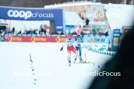 28.01.2024, Goms, Switzerland (SUI): Nadja Kaelin (SUI), Kerttu Niskanen (FIN), (l-r)  - FIS world cup cross-country, mass, Goms (SUI). www.nordicfocus.com. © Modica/NordicFocus. Every downloaded picture is fee-liable.