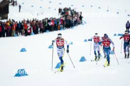 26.01.2024, Goms, Switzerland (SUI): Johan Haeggstroem (SWE), Lauri Vuorinen (FIN), (l-r)  - FIS world cup cross-country, mixed relay, Goms (SUI). www.nordicfocus.com. © Modica/NordicFocus. Every downloaded picture is fee-liable.