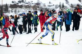 26.01.2024, Goms, Switzerland (SUI): Kristin Austgulen Fosnaes (NOR), Ebba Andersson (SWE), (l-r)  - FIS world cup cross-country, mixed relay, Goms (SUI). www.nordicfocus.com. © Modica/NordicFocus. Every downloaded picture is fee-liable.