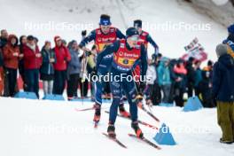 26.01.2024, Goms, Switzerland (SUI): Elia Barp (ITA), Hugo Lapalus (FRA), (l-r)  - FIS world cup cross-country, mixed relay, Goms (SUI). www.nordicfocus.com. © Modica/NordicFocus. Every downloaded picture is fee-liable.
