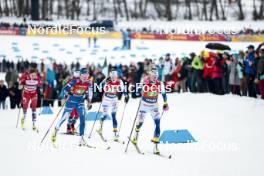 26.01.2024, Goms, Switzerland (SUI): Kerttu Niskanen (FIN), Frida Karlsson (SWE), (l-r)  - FIS world cup cross-country, mixed relay, Goms (SUI). www.nordicfocus.com. © Modica/NordicFocus. Every downloaded picture is fee-liable.