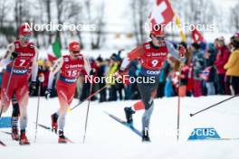 26.01.2024, Goms, Switzerland (SUI): Cyril Faehndrich (SUI), Antoine Cyr (CAN), (l-r)  - FIS world cup cross-country, mixed relay, Goms (SUI). www.nordicfocus.com. © Modica/NordicFocus. Every downloaded picture is fee-liable.
