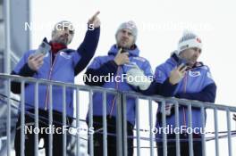 14.01.2024, Oberstdorf, Germany (GER): Coach Christoph Eugen (AUT), Coach Thomas Egger-Riedmueller (AUT), Wilhelm Denifl (AUT), (l-r)  - FIS world cup nordic combined men, compact HS106/7.5km, Oberstdorf (GER). www.nordicfocus.com. © Volk/NordicFocus. Every downloaded picture is fee-liable.