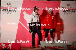 13.01.2024, Oberstdorf, Germany (GER): Jarl Magnus Riiber (NOR), Mari Leinand Lund (NOR), (l-r)  - FIS world cup nordic combined men, individual gundersen HS106/10km, Oberstdorf (GER). www.nordicfocus.com. © Volk/NordicFocus. Every downloaded picture is fee-liable.