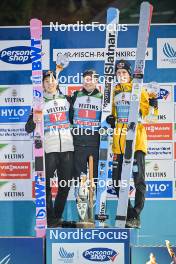 01.01.2024, Garmisch, Germany (GER): Ryoyu Kobayashi (JPN), Anze Lanisek (SLO), Andreas Wellinger (GER), (l-r) - FIS world cup ski jumping men, four hills tournament, individual HS142, Garmisch (GER). www.nordicfocus.com. © Reichert/NordicFocus. Every downloaded picture is fee-liable.