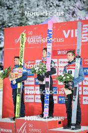 14.01.2024, Wisla, Poland (POL): Stefan Kraft (AUT), Ryoyu Kobayashi (JPN), Andreas Wellinger (GER), (l-r) - FIS world cup ski jumping men, individual HS140, Wisla (POL). www.nordicfocus.com. © Reichert/NordicFocus. Every downloaded picture is fee-liable.