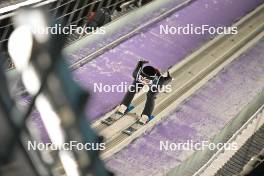 13.01.2024, Wisla, Poland (POL): Daniel Andrei Cacina (ROU) - FIS world cup ski jumping men, super team HS140, Wisla (POL). www.nordicfocus.com. © Reichert/NordicFocus. Every downloaded picture is fee-liable.
