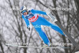 13.01.2024, Wisla, Poland (POL): Daniel Andrei Cacina (ROU) - FIS world cup ski jumping men, super team HS140, Wisla (POL). www.nordicfocus.com. © Reichert/NordicFocus. Every downloaded picture is fee-liable.