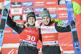 24.02.2024, Oberstdorf, Germany (GER): Peter Prevc (SLO), Timi Zajc (SLO), (l-r) - FIS world cup ski jumping men, individual HS235, Oberstdorf (GER). www.nordicfocus.com. © Reichert/NordicFocus. Every downloaded picture is fee-liable