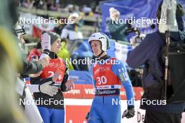 24.02.2024, Oberstdorf, Germany (GER): Domen Prevc (SLO), Peter Prevc (SLO), (l-r) - FIS world cup ski jumping men, individual HS235, Oberstdorf (GER). www.nordicfocus.com. © Reichert/NordicFocus. Every downloaded picture is fee-liable