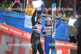 23.02.2024, Oberstdorf, Germany (GER): Timi Zajc (SLO), Domen Prevc (SLO), (l-r)  - FIS world cup ski jumping men, super team HS235, Oberstdorf (GER). www.nordicfocus.com. © Reichert/NordicFocus. Every downloaded picture is fee-liable