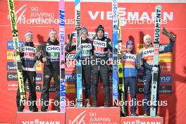 23.02.2024, Oberstdorf, Germany (GER): Kristoffer Eriksen Sundal (NOR), Johann Andre Forfang (NOR), Domen Prevc (SLO), Timi Zajc (SLO), Stefan Kraft (AUT), Michael Hayboeck (AUT), (l-r) - FIS world cup ski jumping men, super team HS235, Oberstdorf (GER). www.nordicfocus.com. © Reichert/NordicFocus. Every downloaded picture is fee-liable
