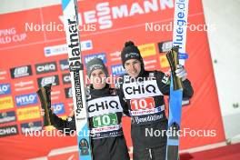 23.02.2024, Oberstdorf, Germany (GER): Domen Prevc (SLO), Timi Zajc (SLO), (l-r) - FIS world cup ski jumping men, super team HS235, Oberstdorf (GER). www.nordicfocus.com. © Reichert/NordicFocus. Every downloaded picture is fee-liable