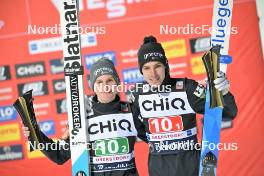 23.02.2024, Oberstdorf, Germany (GER): Domen Prevc (SLO), Timi Zajc (SLO), (l-r) - FIS world cup ski jumping men, super team HS235, Oberstdorf (GER). www.nordicfocus.com. © Reichert/NordicFocus. Every downloaded picture is fee-liable