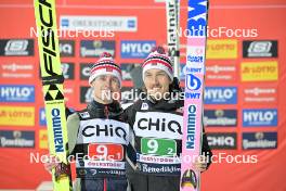 23.02.2024, Oberstdorf, Germany (GER): Kristoffer Eriksen Sundal (NOR), Johann Andre Forfang (NOR), (l-r) - FIS world cup ski jumping men, super team HS235, Oberstdorf (GER). www.nordicfocus.com. © Reichert/NordicFocus. Every downloaded picture is fee-liable