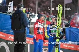 23.02.2024, Oberstdorf, Germany (GER): Piotr Zyla (POL), Aleksander Zniszczol (POL), (l-r)  - FIS world cup ski jumping men, super team HS235, Oberstdorf (GER). www.nordicfocus.com. © Reichert/NordicFocus. Every downloaded picture is fee-liable